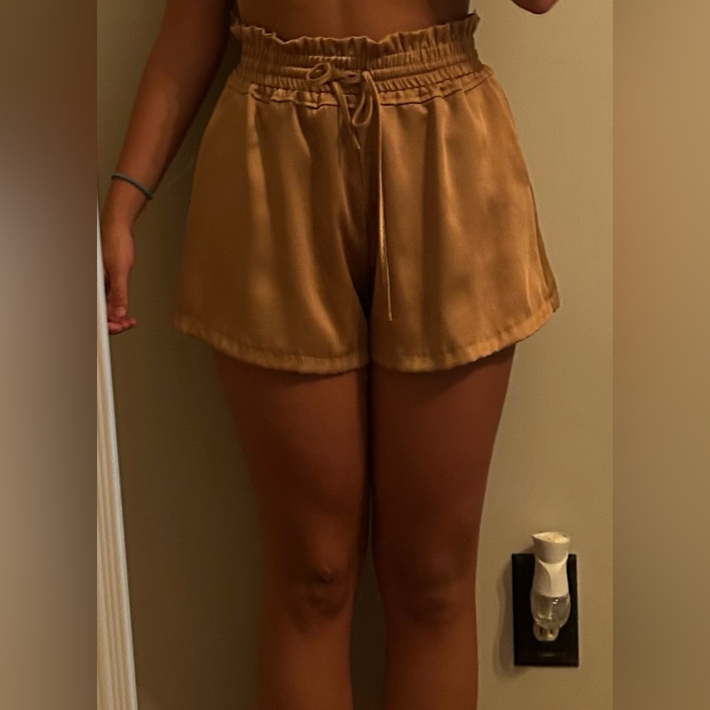 black ruffled shorts